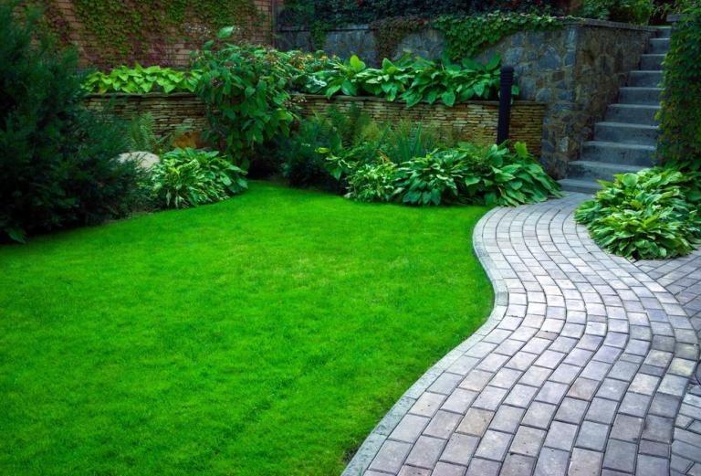 Maçonnerie paysagère : techniques pour structurer votre jardin